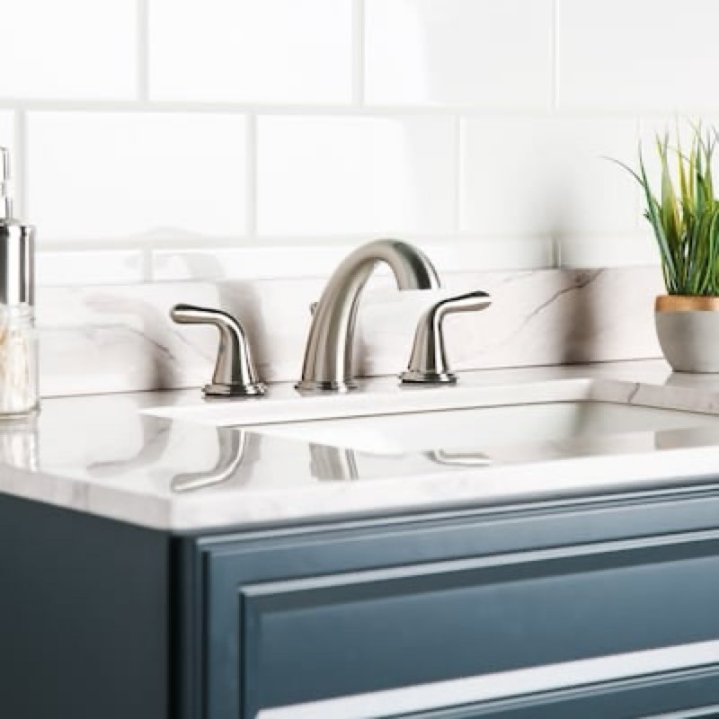 Condition photo showing As Is for  project source dover brushed nickel widespread 2-handle watersense mid-arc residential handle