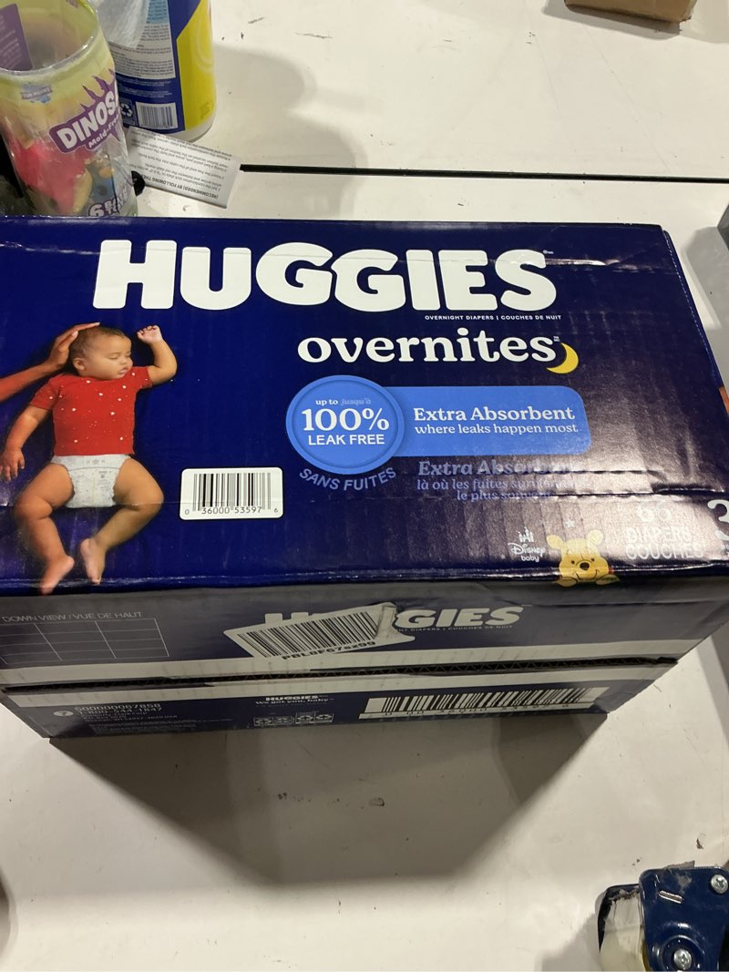 Condition photo showing Good Condition for huggies overnites size 3 overnight diapers (16-28 lbs), 66 ct, packaging may vary size 3 66
