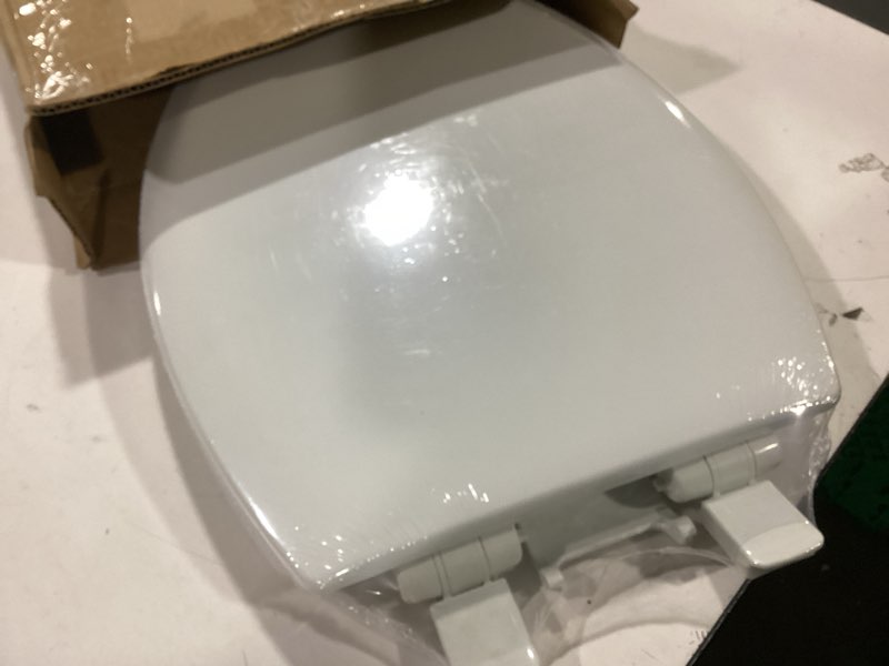 Condition photo showing New/Like New for mayfair nextstep2 toilet seat with built-in potty training seat, slow-close, removable that will never loosen, elongated, white elongated 2-in-1 toilet seat