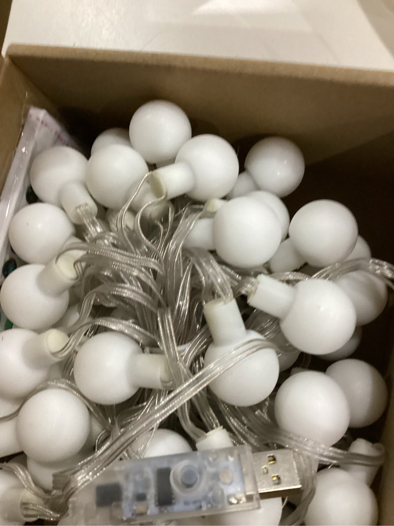 Condition photo showing As Is for OMIKA Smart Christmas Lights Indoor, 29.5ft 60LED 213 Modes USB Powered Decorative Lights, Color Changing Globe Fairy String Lights APP Remote Music for Room Party Wedding Xmas Girl Tent Outdoor Décor Smart APP Dreamcolor 29.5ft 60LED(USB)