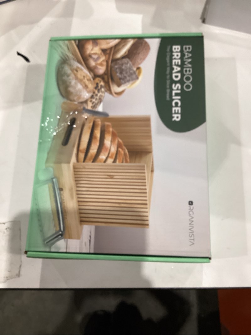 Condition photo showing New/Like New for Adjustable bread loaf slicer + bread slicer guide for sourdough; sandwich bread slicer, butter cutter and spreader knife + foldable design, crumb tray, non-slip base, compact storage