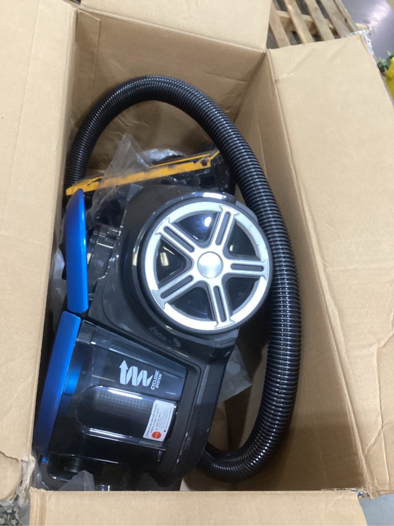 Condition photo showing As Is for eureka bagless canister vacuum with washable hepa filter, 16kpa suction for carpets/hard floors, compact design with 3 cleaning tools, 2-motor household vacuum, lightweight and easy maneuverable indigo blue