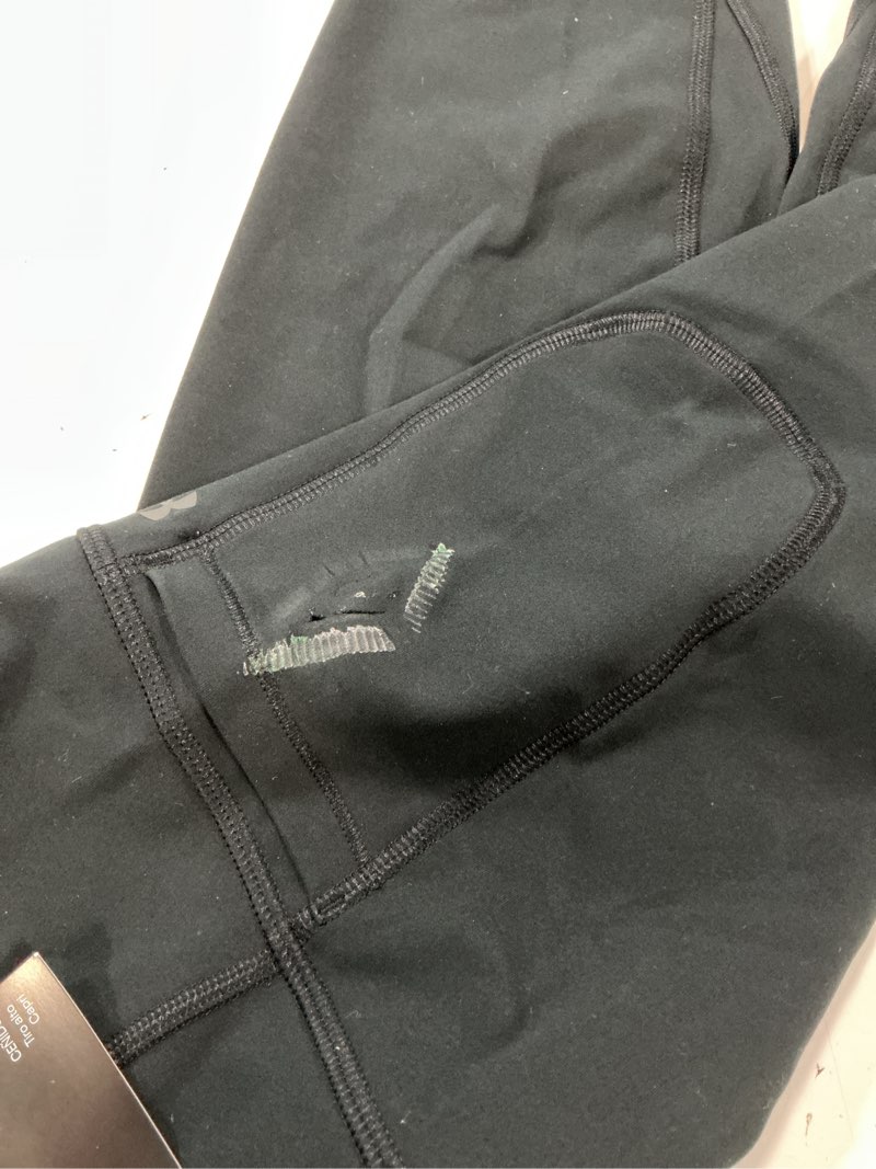 Condition photo showing As Is for under armour women's motion capri