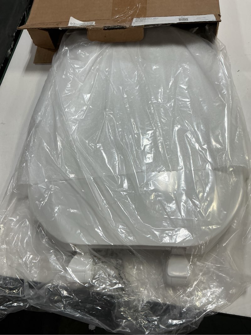 Condition photo showing New/Like New for centoco eljer emblem elongated toilet seat with square shape closed front with cover residential plastic made in the usa emb601-001 white elongated 001-white