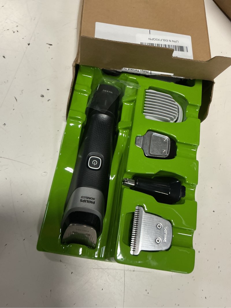 Condition photo showing As Is for philips norelco all-in-one 18-piece trimmer 5000 series - shaver and clipper for face, hair & body, self-sharpening titanium coated blades, 16 length settings (0.5-16 mm), wide hair clipper, mg5970/49 black mg5970/49 - 18 pieces + ti blades & bag