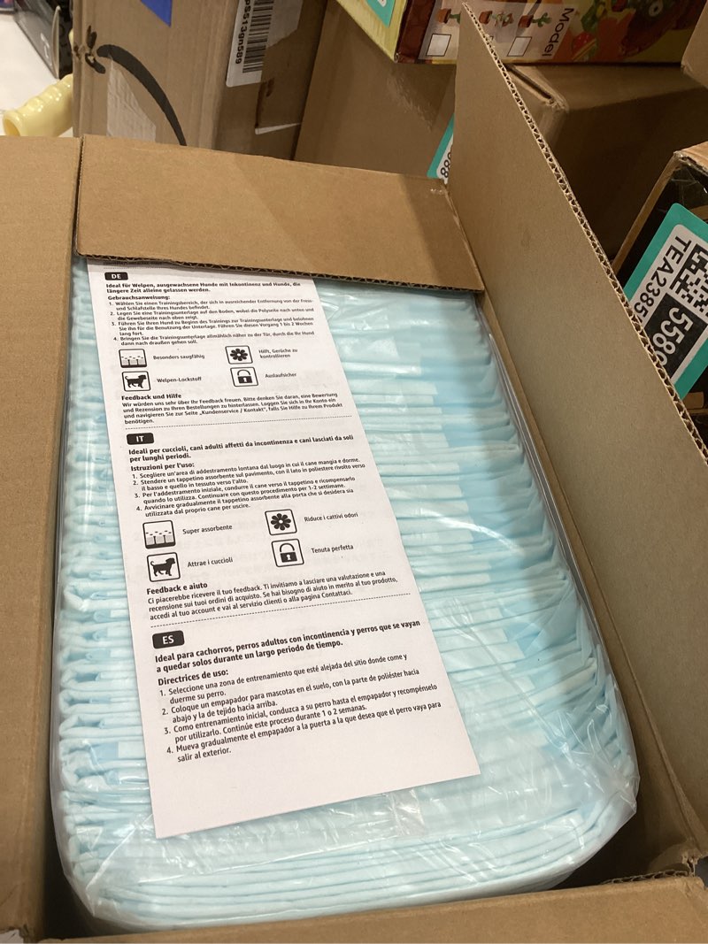 Condition photo showing New/Like New for Amazon Basics Dog and Puppy Pee Pads, 5-Layer Leak-Proof Super Absorbent, Quick-Dry Surface, Potty Training, Regular (22x22"), 100 Count, Blue & White Regular (100 Count)