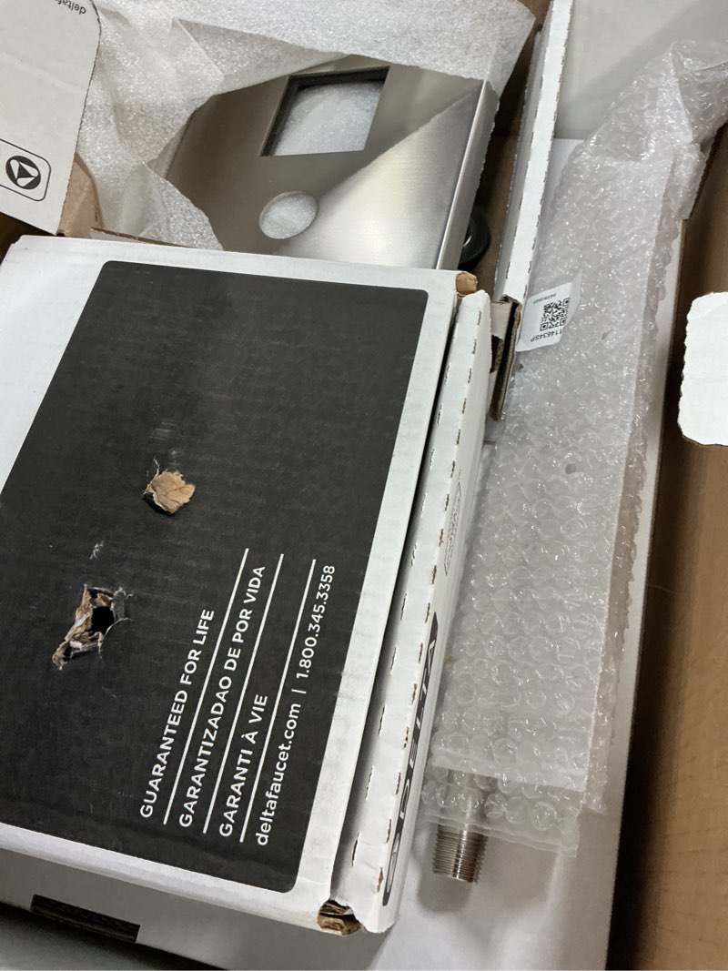 Condition photo showing As Is for delta modern 14 series square rain shower system faucet set, rainfall brushed nickel shower head and handle set, valve trim kit, 10 inch, spotshield stainless 342701-sp