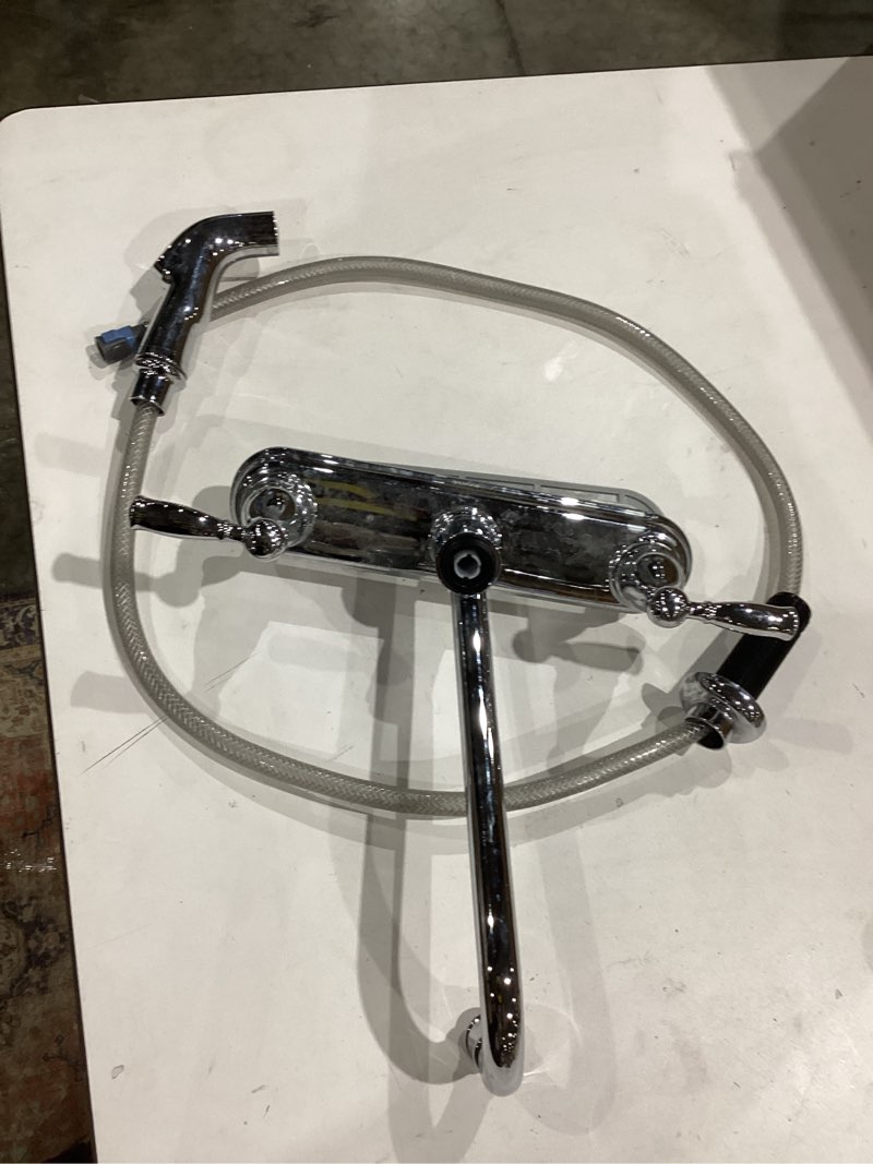Condition photo showing As Is for delta chrome 2-handle high arc kitchen faucet with side sprayer 4-hole mount