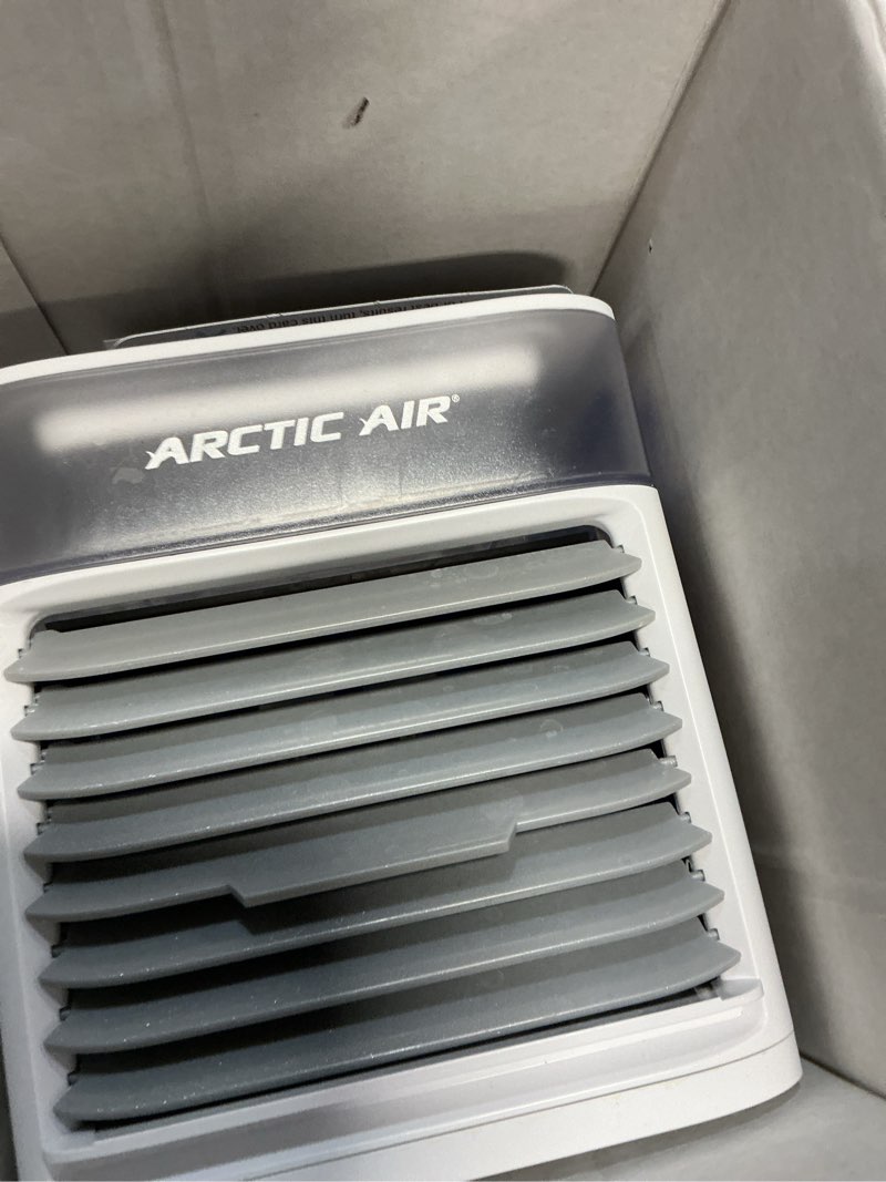 Condition photo showing As Is for arctic air pure chill evaporative air cooler by ontel - powerful 3-speed personal space cooler, quiet, lightweight and portable for bedroom, office, living room & more