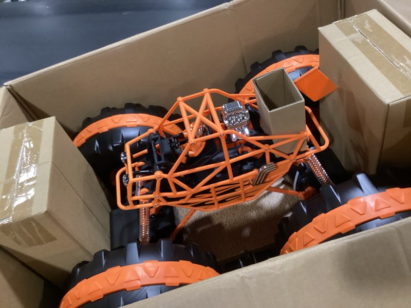 Condition photo showing Good Condition for sharper image® 4x4 giant crusher remote control 4wd truck, high-speed off-road monster truck, all-terrain tires, led headlights, usb-c rechargeable battery, oversized shocks, 2.4 ghz wireless control