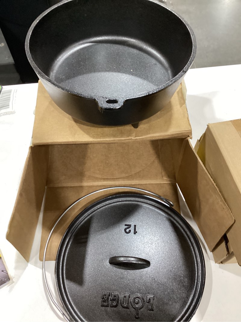 Condition photo showing As Is for lodge logic camp oven 6 qt. cast iron pre-seasoned, round 12"
