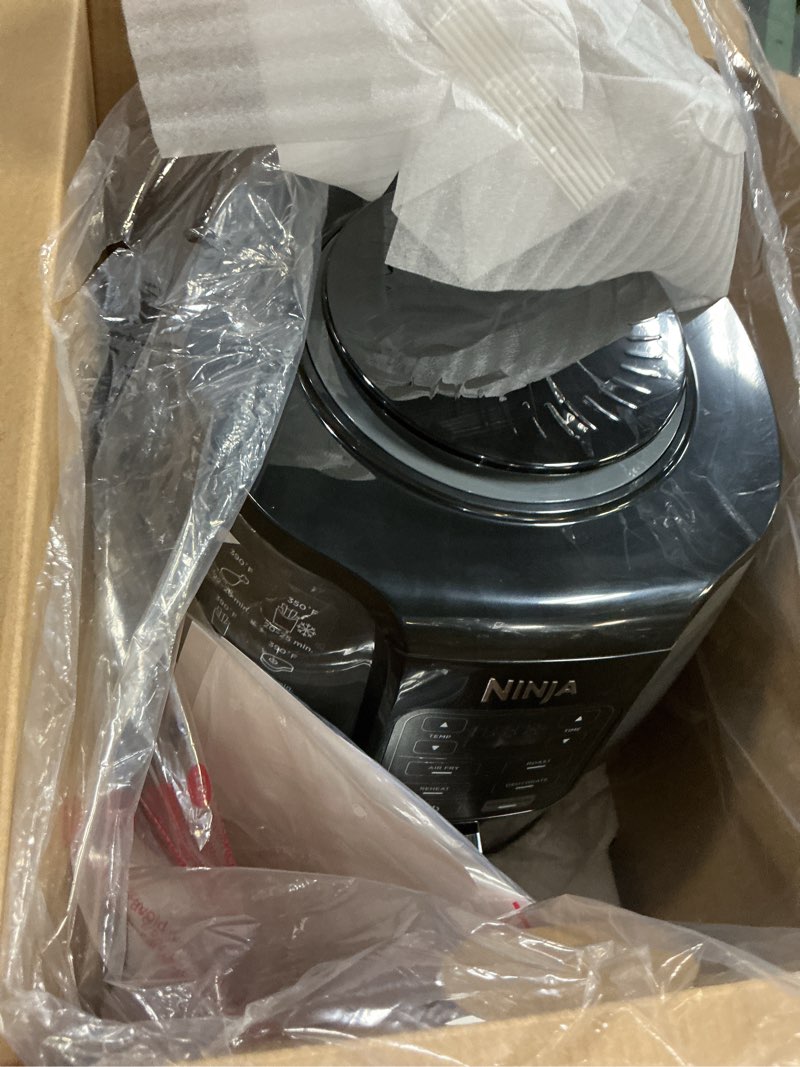 Condition photo showing As Is for ninja air fryer | 4 qt capacity | 4-in-1 roast, crisp, roast, reheats, & dehydrates | dishwasher safe parts | 105°f-400°f | includes 20 easy & healthy recipes | 1550 watt | grey | af101