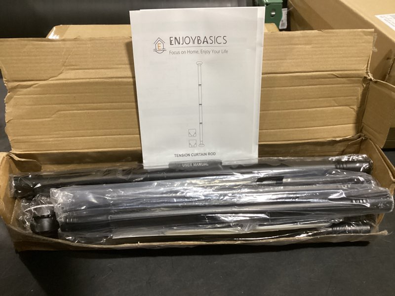 Condition photo showing New/Like New for ENJOYBASICS 2 Pack Adjustable Spring Tension Curtain Rods 32 to 66 Inches, Stainless Steel Matte Black Shower Rod No Drilling for Window, Bathroom, Closet, Room Divider, 7/8" Diameter Black 32-66"