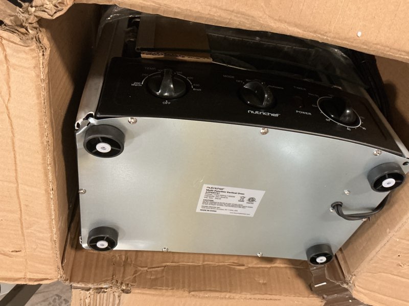 Condition photo showing As Is for Nutrichef Vertical Countertop Oven with Rotisserie, Bake, Broil, & Kebab Rack Functions - Adjustable Settings - 2 Shelves - 1500W - Thanksgiving Turkey - Includes Grill, Kebab skewer racks & bake pan