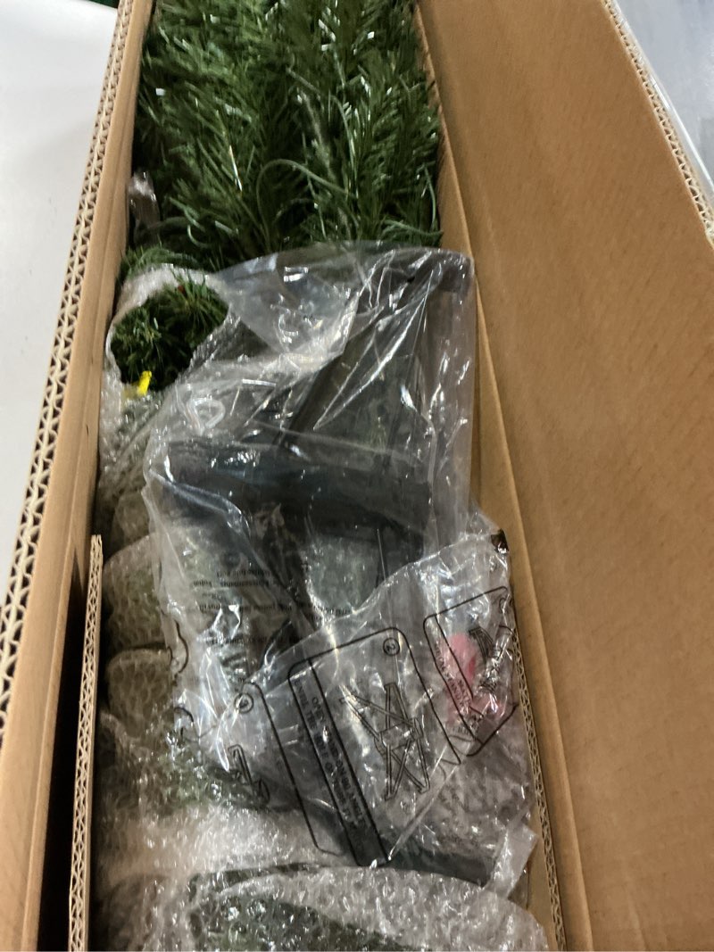 Condition photo showing New/Like New for National Tree Company Pre-Lit Artificial Full Christmas Tree, Green, North Valley Spruce, Multicolor Lights, Includes Stand, 4.5 Feet 4.5 ft