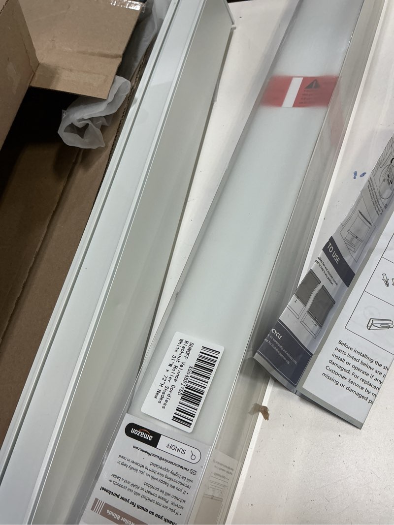 Condition photo showing As Is for Cordless Blackout Roller Shades Blinds for Windows Free-Stop,Pull Down Room Darkening with Valance,Thermal Insulated Woven Fabric Window Door Blinds for Home,Office,White 31" W x 72" L 31"W x 72"H White