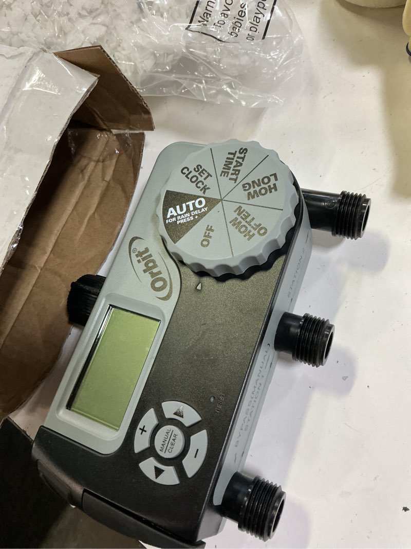 Condition photo showing Good Condition for orbit 56233d 3-outlet digital watering timer, 3 valves, black and gray 3 outlet (2 digital, 1 manual)