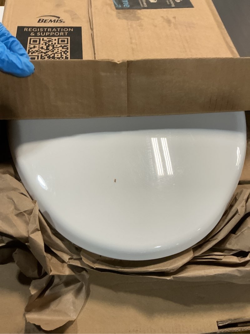 Condition photo showing As Is for Mayfair Little2Big? Elongated Plastic Toilet Seat in White with STA-TITE? Seat Fastening System? and Whisper•Close? Hinge