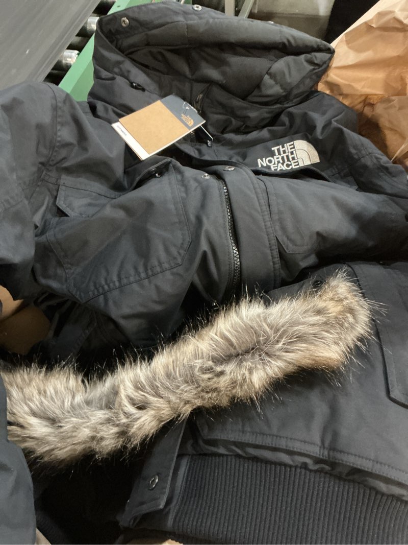 Condition photo showing Good Condition for (Size:L)THE NORTH FACE Men's McMurdo Bomber Jacket | Waterproof, Waterfowl Down Insulation, Hooded Jacket Large Tnf Black/Tnf Black