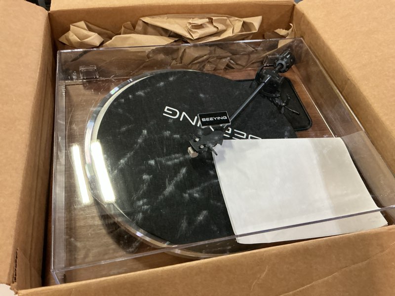 Condition photo showing As Is for seeying vinyl record player with built in hifi speakers, bluetooth belt drive turntable for vinyl records with magnetic cartridge, auto stop and warm light design brown