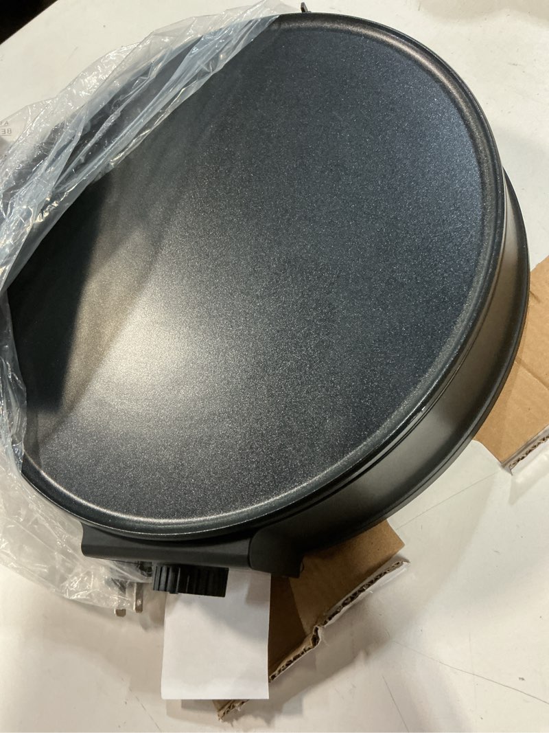 Condition photo showing Good Condition for moss & stone 12” electric griddle pan & crepe machine, non-stick electric crepe maker with adjustable temperature, includes spreader & spatula – ideal for pancakes, blintzes & tortillas 12 inch corded black / round
