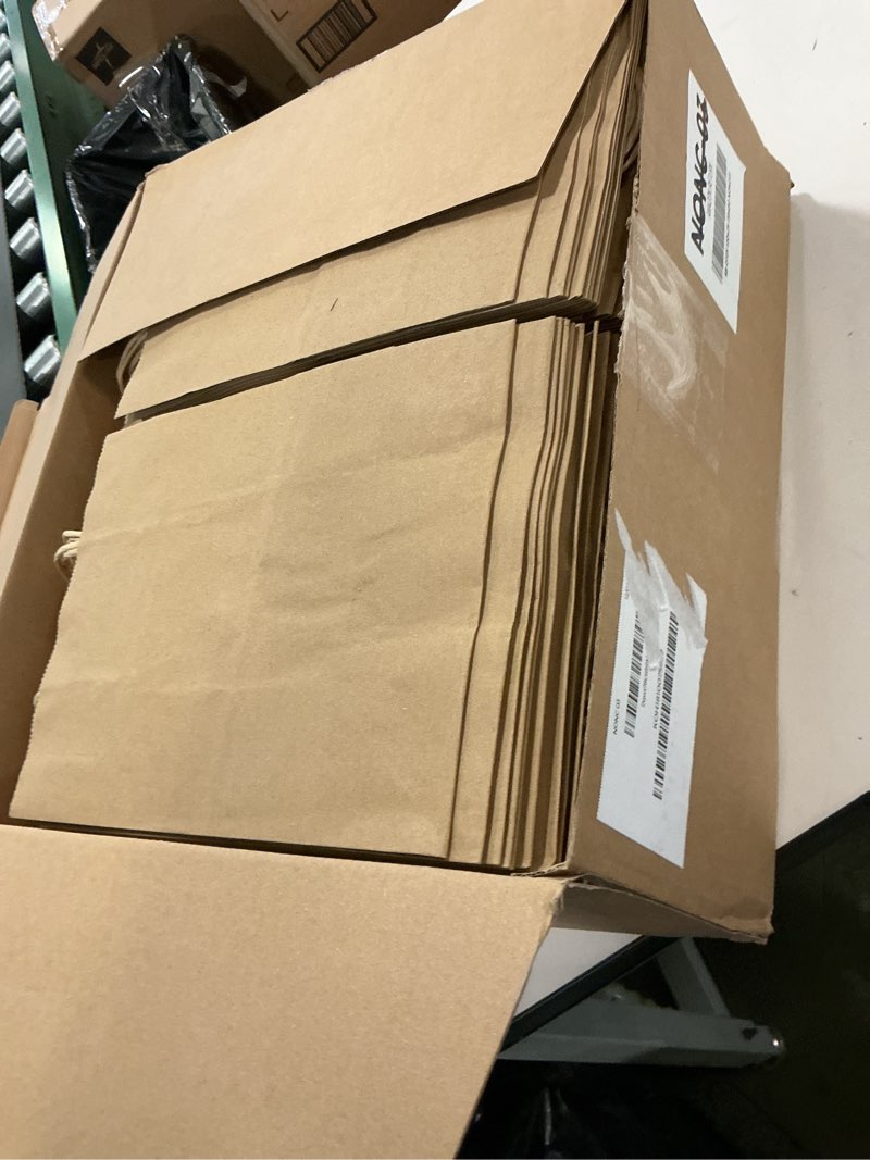 Condition photo showing New/Like New for XPCARE 200Pack Paper Bags 8x4.5x10 Inch, Plain Medium Paper Bags with Handles Bulk, Kraft Paper Gift Bag, Retail, Party, Shopping, Favor Bag (Brown)