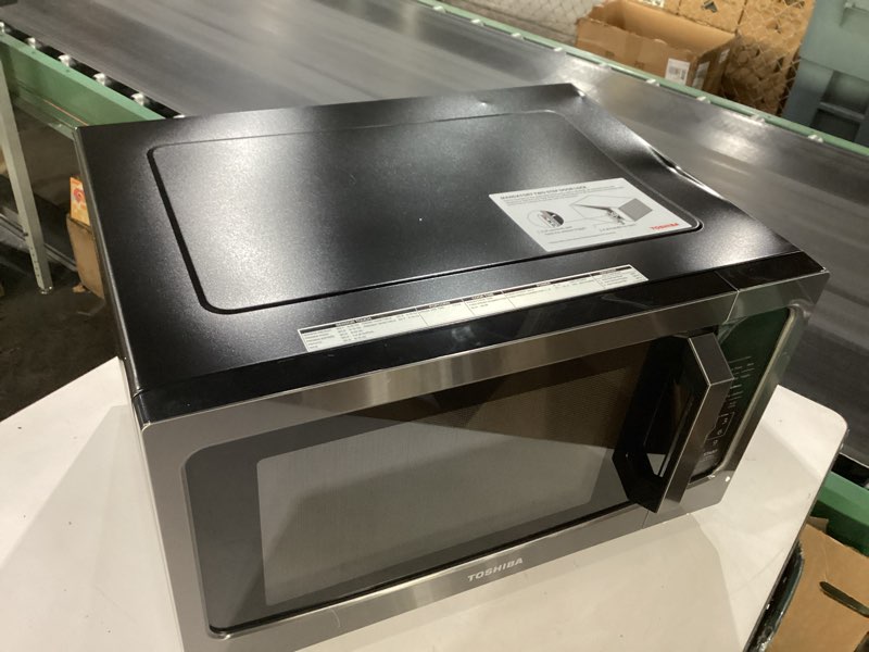 Condition photo showing As Is for toshiba ml-em45p(bs) countertop microwave oven with smart sensor and 13.6" removable position memory turntable, sound on/off function, 1200w, 1.6 cu.ft, black stainless steel sensor-1.6 cu.ft.