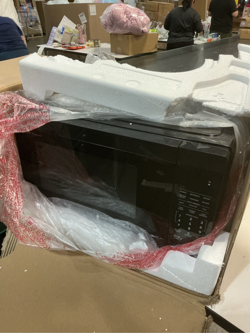 Condition photo showing As Is for SHARP Countertop Microwave Oven with Removable 12.4" Carousel Turntable, 1000 Watt, 1.1 Cubic Feet, Black