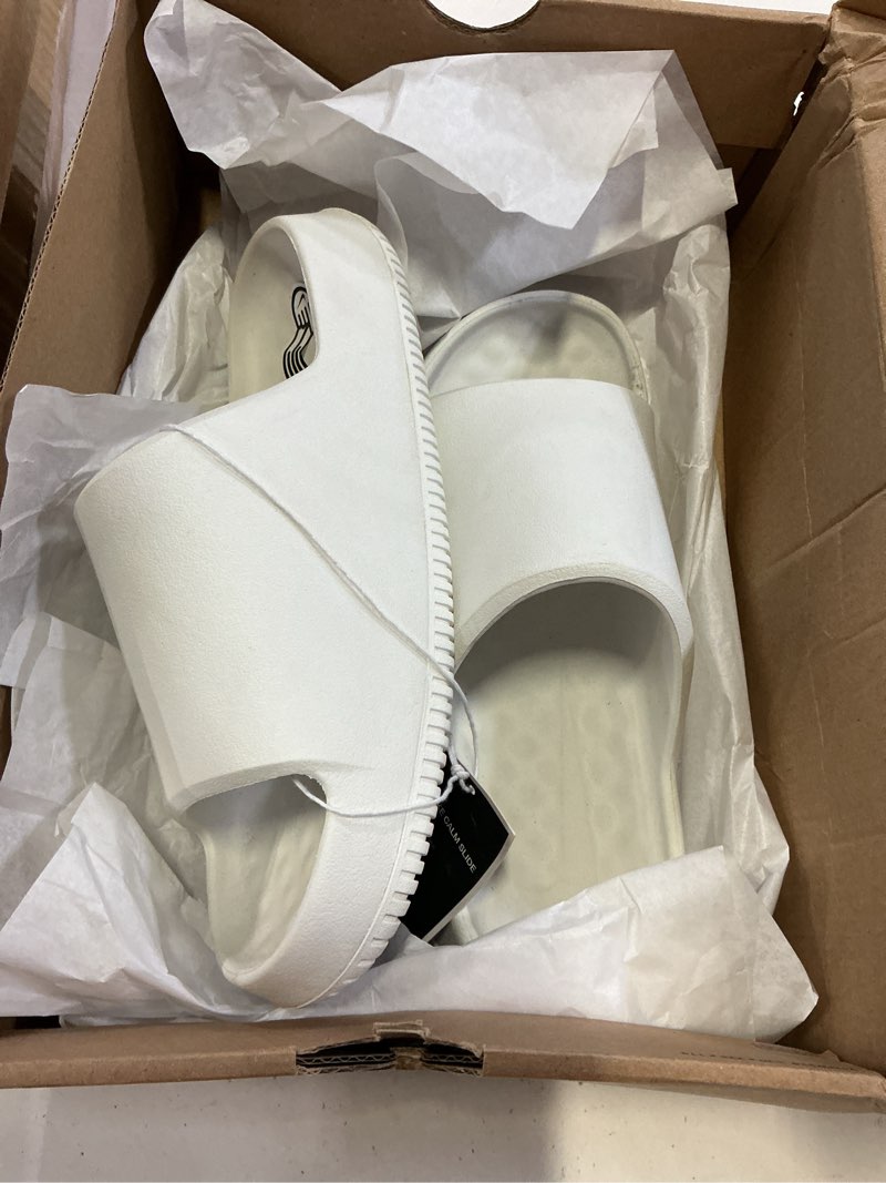 Condition photo showing New/Like New for nike women's calm 2.0 slides 8 sail/sail/sail