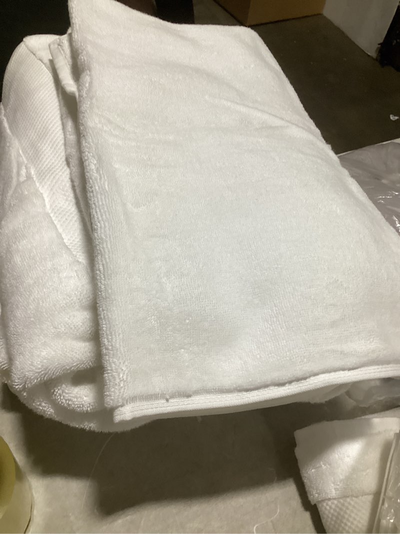 Condition photo showing As Is for miscellaneous towels (colors may vary)