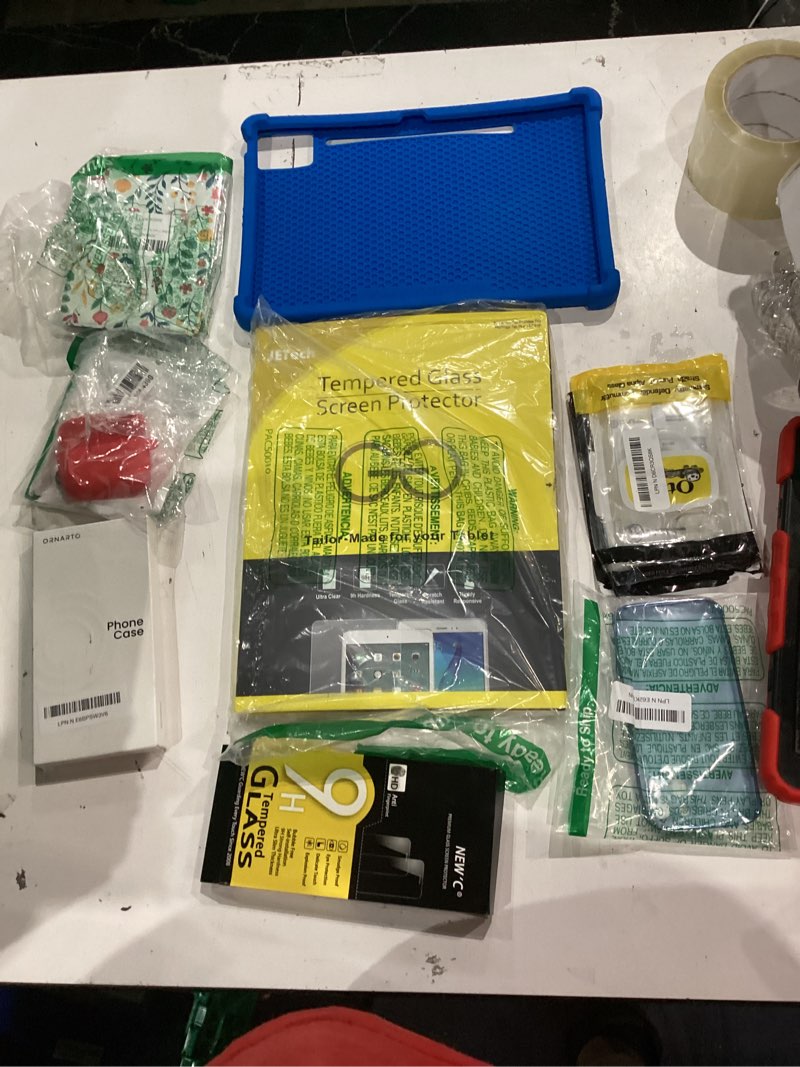 Condition photo showing As Is for assorted cellphone/tablet/laptop case covers & accessories