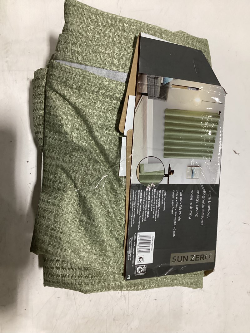 Condition photo showing As Is for sun zero vance 2-piece magnetic closure 100% blackout back tab curtain panel pair, 37"x84", sage green