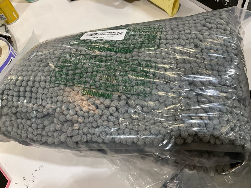 Condition photo showing As Is for OLANLY Dog Door Mat for Muddy Paws 36x24, Paw Print Design, Absorbs Moisture and Dirt, Absorbent Non-Slip Washable Doormat, Quick Dry Chenille Mud Mat for Dogs, Entry Indoor Entryway Carpet, Grey Grey Paw Print 36" x 24"