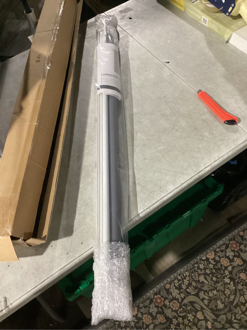 Condition photo showing New/Like New for LazBlinds No Tools No Drill Cordless Roller Shades, 100% Blackout Roller Blinds for Windows, Thermal Insulated UV Protection Waterproof Roll Up Window Blinds and Shades, 35'' W x 48'' H, Grey Grey 35'' W x 48'' H