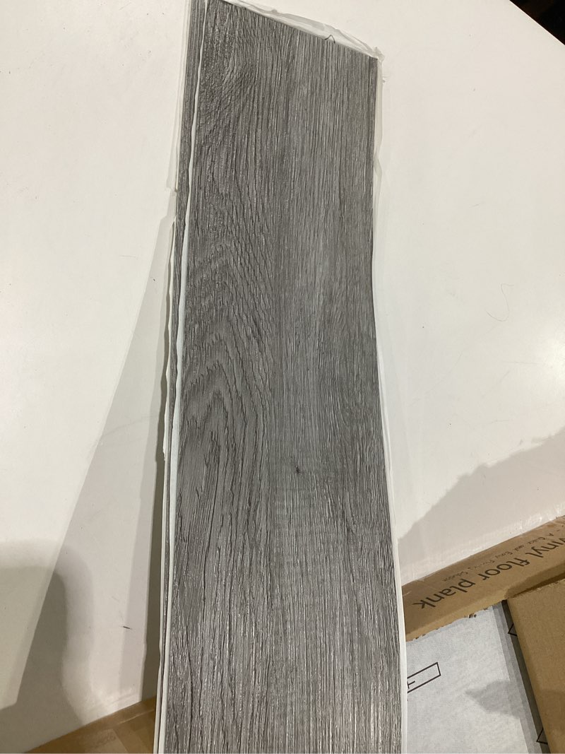 Condition photo showing New/Like New for art3d peel and stick floor tile vinyl wood plank 36-pack 54 sq.ft, deep gray, rigid surface hard core easy diy self-adhesive flooring 36 x 6 x 0.1 inches deep grey 36