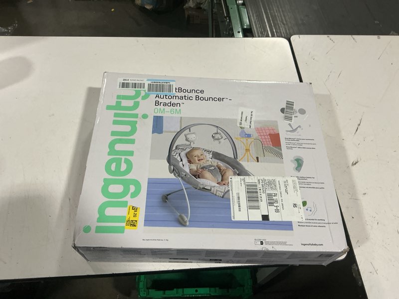 Condition photo showing New/Like New for ingenuity smartbounce automatic baby bouncer seat with white noise, music, toy bar & 2 plush infant toys, 0-6 months up to 20 lbs (braden)