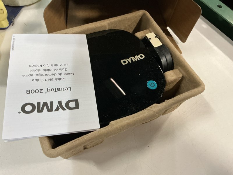 Condition photo showing As Is for dymo letratag 200 bluetooth label maker, includes 1 white paper label tape