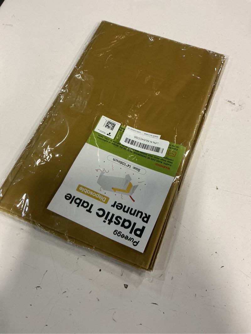 Condition photo showing New/Like New for Pureegg Gold Plastic Table Runners - 10 Pack, 14'' x 108'', Water Resistant & Disposable Centerpiece Decorations for Table Cloth, Wedding, Birthday, Holiday, Baby Shower, Party, Home Decor Gold 10 Pack – 14" x 108"
