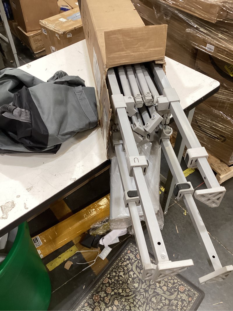 Condition photo showing Good Condition for e-z up ambassador instant pop up canopy tent, 10' x 10', roller bag and 4 piece spike set, slate white white slate shelter canopy