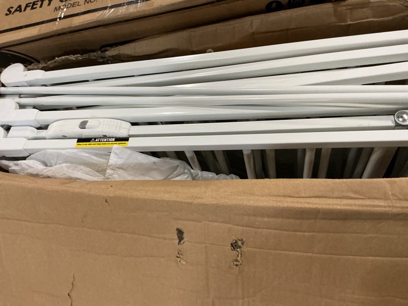 Condition photo showing As Is for regalo safety 192" super wide baby gate & play yard, 2-in-1 convertible extra wide safety barrier, hardware mounted for toddlers & pets, tested & safe for 30 years, american designed & owned, white 50.5-192"w x 28"h white