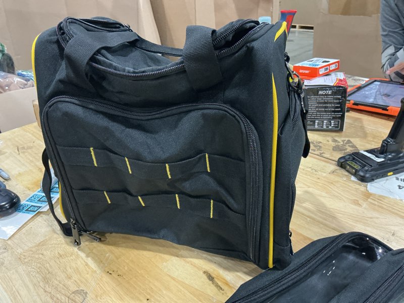 Condition photo showing Good Condition for marscamd 12-inch tool bag with multiple pockets, heavy duty tool tote | with front molle straps & detachable shoulder strap, black