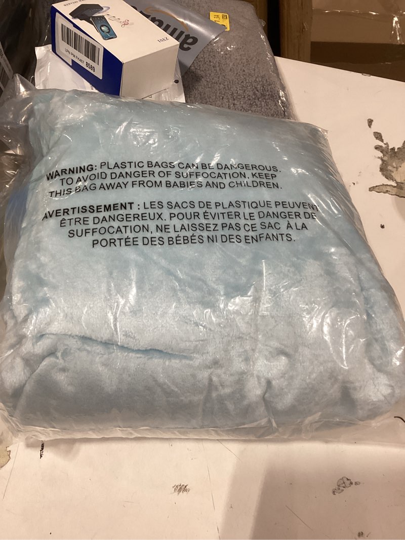 Condition photo showing New/Like New for similar productexclusivo mezcla throw blanket for couch, cozy lightweight fleece blankets with decorative wave textured suitable for winter, light blue, 50x70 inches light blue throw ( 50x70 in )