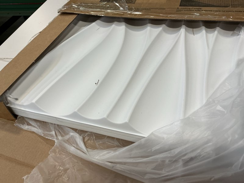 Condition photo showing As Is for (Incomplete) Art3d 19.7\" x 19.7\" (Pack Of 12) Wall Panel Wavy, White Wavy White 19.7\" x 19.7\"