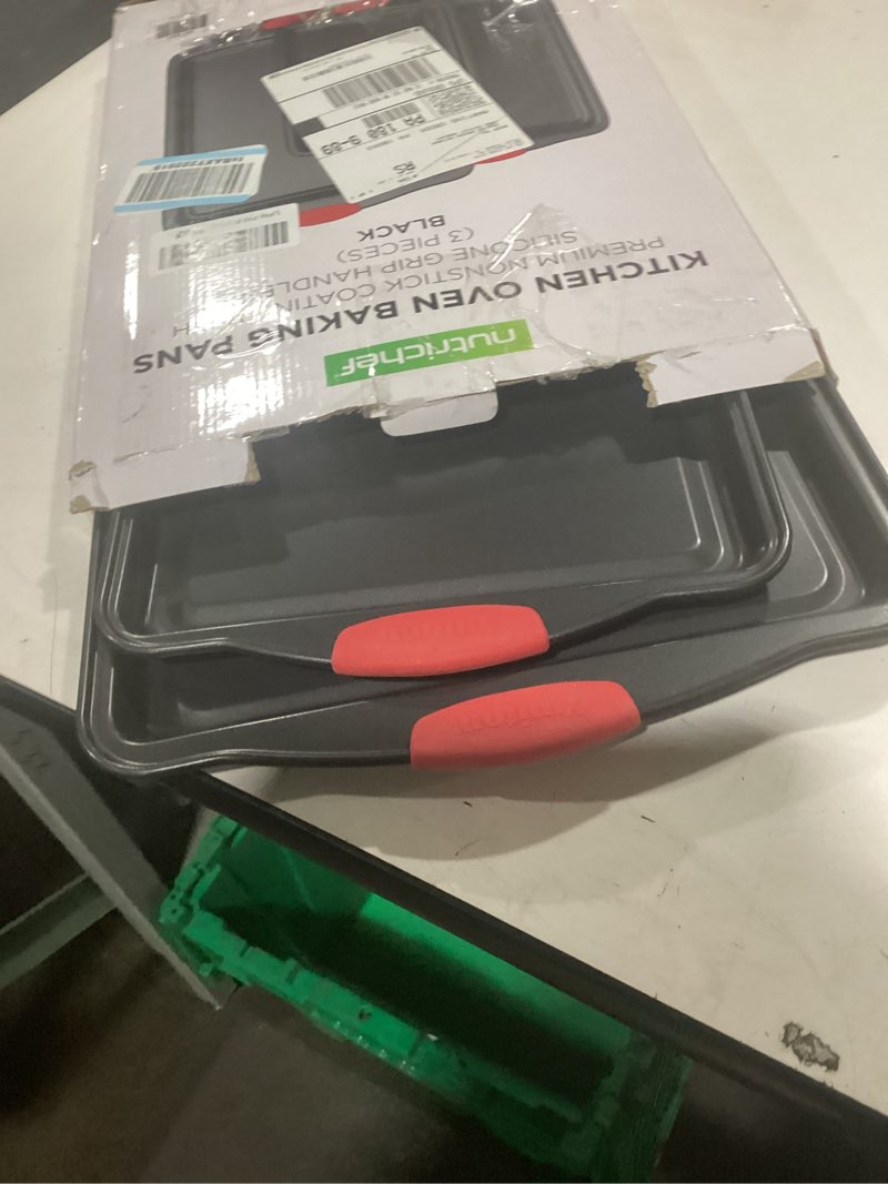 Condition photo showing Good Condition for NutriChef 3-Piece Nonstick Kitchen Oven Baking Pans - Premium & Stylish Non-Stick Steel, Commercial Grade Restaurant Quality Metal Bakeware with Red Silicone Handles - Easy to Clean, NCSBS3S