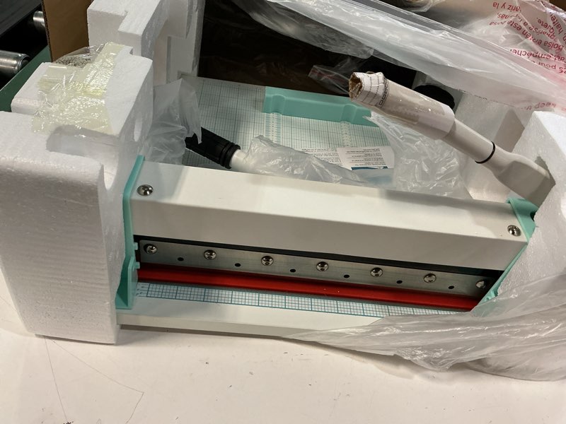 Condition photo showing As Is for We R Makers Cinch Stack Cutter, Heavy Duty Guillotine Paper Cutter for 1” Thick Stacks, Precision Alignment, Easy Operation, Paper Cutter Guillotine for Scrapbooking, Card Making, and Crafting