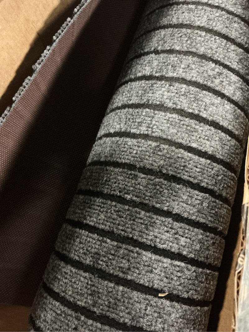 Condition photo showing Good Condition for runner rug 2 ft x 10 ft indoor/outdoor low profile, hallway, kitchen, patio, deck area, rv, entryway, garage, gray with black stripe, custom