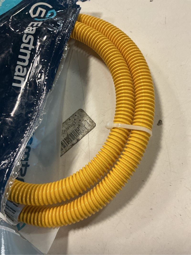 Condition photo showing As Is for Eastman 48 Inch x 1/2 Inch OD Flexible Gas Line Connector with (2) 1/2 Inch MIP Fitting Ends for Natural Gas and Liquid Propane, Stainless Steel, Yellow, 20YE505048B