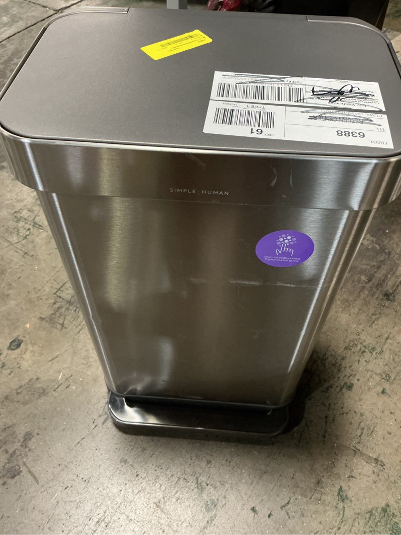 Condition photo showing As Is for simplehuman 45 liter / 12 gallon liter rectangular hands-free kitchen step trash can with soft-close lid, brushed stainless steel with plastic lid brushed stainless steel (with plastic lid) 45 liters