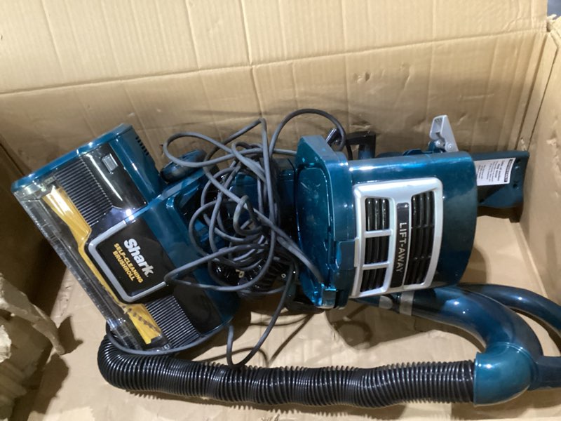 Condition photo showing As Is for shark upright vacuum, navigator lift-away with self-cleaning brushroll, hepa filter, swivel steering, upholstery tool & pet crevice tool, perfect for pets & multi-surface, teal, zu503amz, not tested