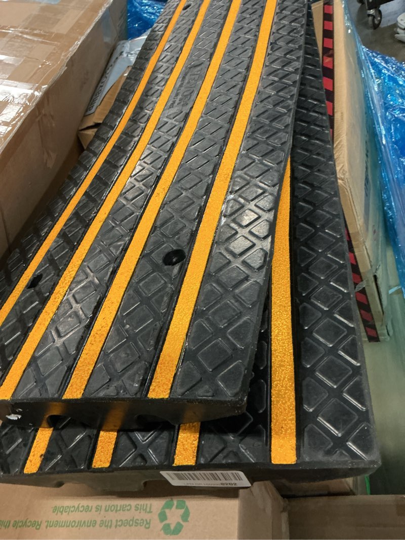 Condition photo showing Good Condition for vevor car driveway rubber curb ramp, 2 pack 4ft long heavy duty low profile slope ramps, 2.6’’ rise, 33069 lbs load capacity, reflective safety strips, for vehicles, rvs, and wheelchairs